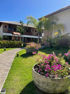 Zahrada ubytování Village em Itacimirm Mirante da Lagoa + 24 fotografií