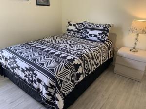 Letto o letti in una camera di Ideal Location On A Golf Complex