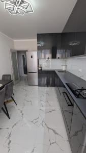 Kuchyň nebo kuchyňský kout v ubytování CityView Lodge + 56 fotografií