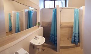 Kúpeľňa v ubytovaní Hostel Universus