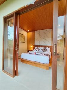 D'JERO HomeStay客房内的一张或多张床位