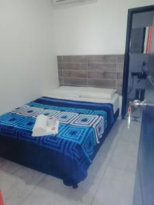 Postel nebo postele na pokoji v ubytování AVENTURa HOTEL