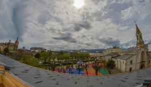 a view of a city from the roof of a building at Hostal Linares in Ribadeo +10 photos