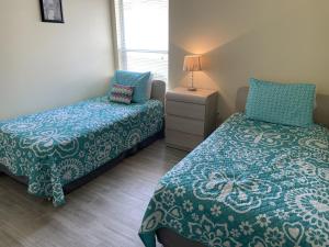 Letto o letti in una camera di Ideal Location On A Golf Complex