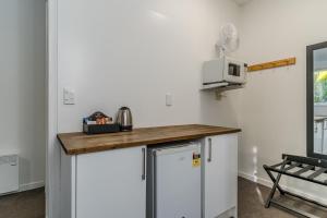 Köök või kööginurk majutusasutuses George Street Motel Apartments