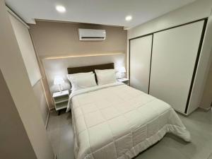 Llit o llits en una habitació de ABIBA Apart-Hotel & SPA