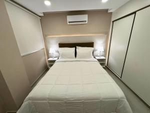 Llit o llits en una habitació de ABIBA Apart-Hotel & SPA