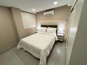 Llit o llits en una habitació de ABIBA Apart-Hotel & SPA