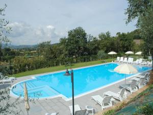 The swimming pool at or close to Air-conditioned flat with pool and wellness area