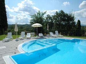 The swimming pool at or close to Air-conditioned flat with pool and wellness area