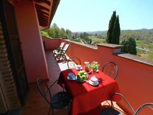 A balcony or terrace at Air-conditioned flat with pool and wellness area