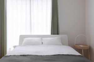 Letto o letti in una camera di 桜の旅