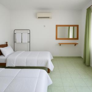 Postel nebo postele na pokoji v ubytování Hostel Colombo Airport