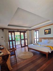 Postel nebo postele na pokoji v ubytování DG ROYAL Resort