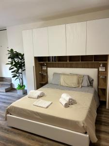 Postel nebo postele na pokoji v ubytování Caprotti 6
