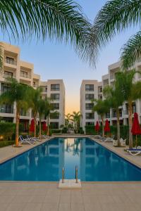 The swimming pool at or close to Porto Said Resort Rentals