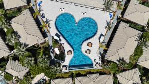 The swimming pool at or close to Porto Amore Club Hotel