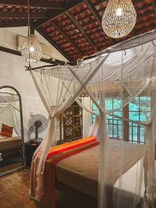 Katil atau katil-katil dalam bilik di Dunes Unawatuna Hotel
