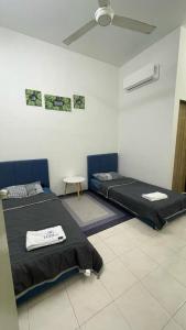 Ruang duduk di Sofea Homestay Tanjong Malim