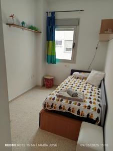 Posteľ alebo postele v izbe v ubytovaní Disfruta Granada,incluso con tu mascota Parking + 14 fotografií