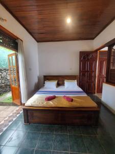 Letto o letti in una camera di Mystique Hideout