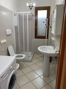 Ένα μπάνιο στο Residenza Sa Conzola