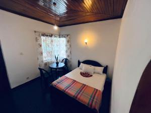 Letto o letti in una camera di Mystique Hideout