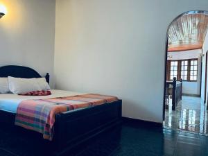 Letto o letti in una camera di Mystique Hideout
