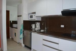 Kuchyň nebo kuchyňský kout v ubytování Caribbean Beachfront Apartment In Margarita Island + 5 fotografií