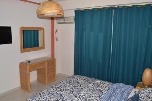 Postel nebo postele na pokoji v ubytování Caribbean Beachfront Apartment In Margarita Island