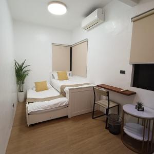 Ένα ή περισσότερα κρεβάτια σε δωμάτιο στο Villa Lorr by Antonio Homes