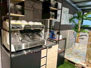 A kitchen or kitchenette at 十月 Mooon House