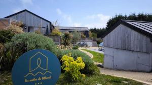 Zahrada ubytování Les suites du littoral - Gîtes proche mer - Piscine - SPA
