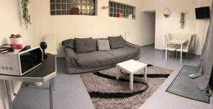 Χώρος καθιστικού στο CHAMBRE TWIN PROCHE de LA GARE