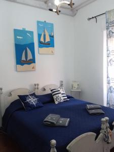Una cama o camas en una habitación de Aligiò 28 fotos más