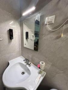 Koupelna v ubytování Krishna home