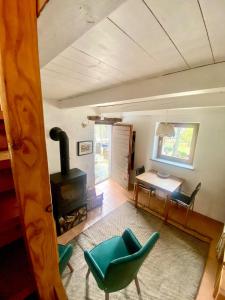 TV i/ili multimedijalni sistem u objektu Rustico dans charmant hameau vue lac Verzasca