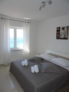 Кровать или кровати в номере Apartments Villa Residenca
