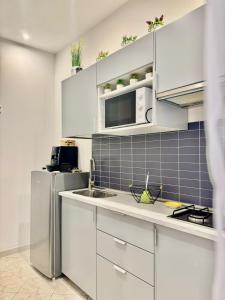 Η κουζίνα ή μικρή κουζίνα στο Home at Corso della Repubblica - Cassino centro +10 φωτογραφίες