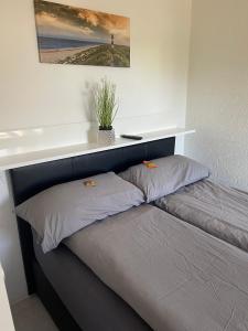 Postel nebo postele na pokoji v ubytování Ferienwohnung schöner Ausblick