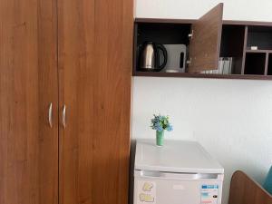 Kuchyň nebo kuchyňský kout v ubytování Hotel NATALI