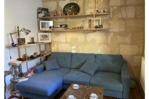 Χώρος καθιστικού στο Chambre dans un appartement avec jardin +1 φωτογραφίες