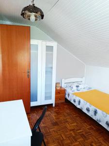 Postel nebo postele na pokoji v ubytování Apartmani Mataija