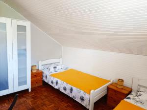 Postel nebo postele na pokoji v ubytování Apartmani Mataija