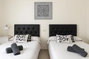 Postel nebo postele na pokoji v ubytování Penthouse Sea View - Valle Romano Golf + 24 fotografií