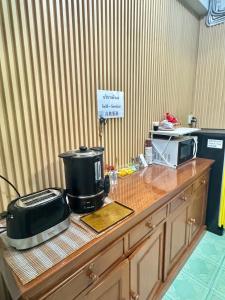 A kitchen or kitchenette at PD Hostel