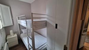 A bed or beds in a room at Apartment Sant Francesc