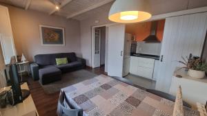 A seating area at Apartment Sant Francesc