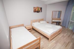 Postel nebo postele na pokoji v ubytování Hotel NATALI