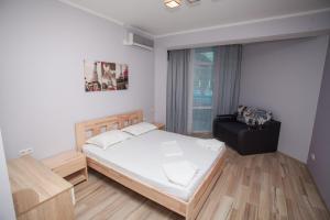 Postel nebo postele na pokoji v ubytování Hotel NATALI